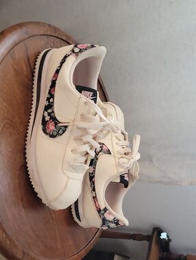 Nike Women’s Cream Sneakers with Black Floral Swoosh